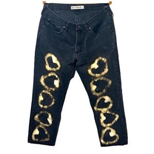 Black denim jeans with contrast hearts